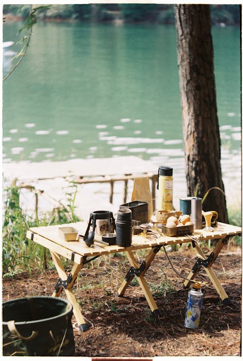 A table with coffee and other items on it