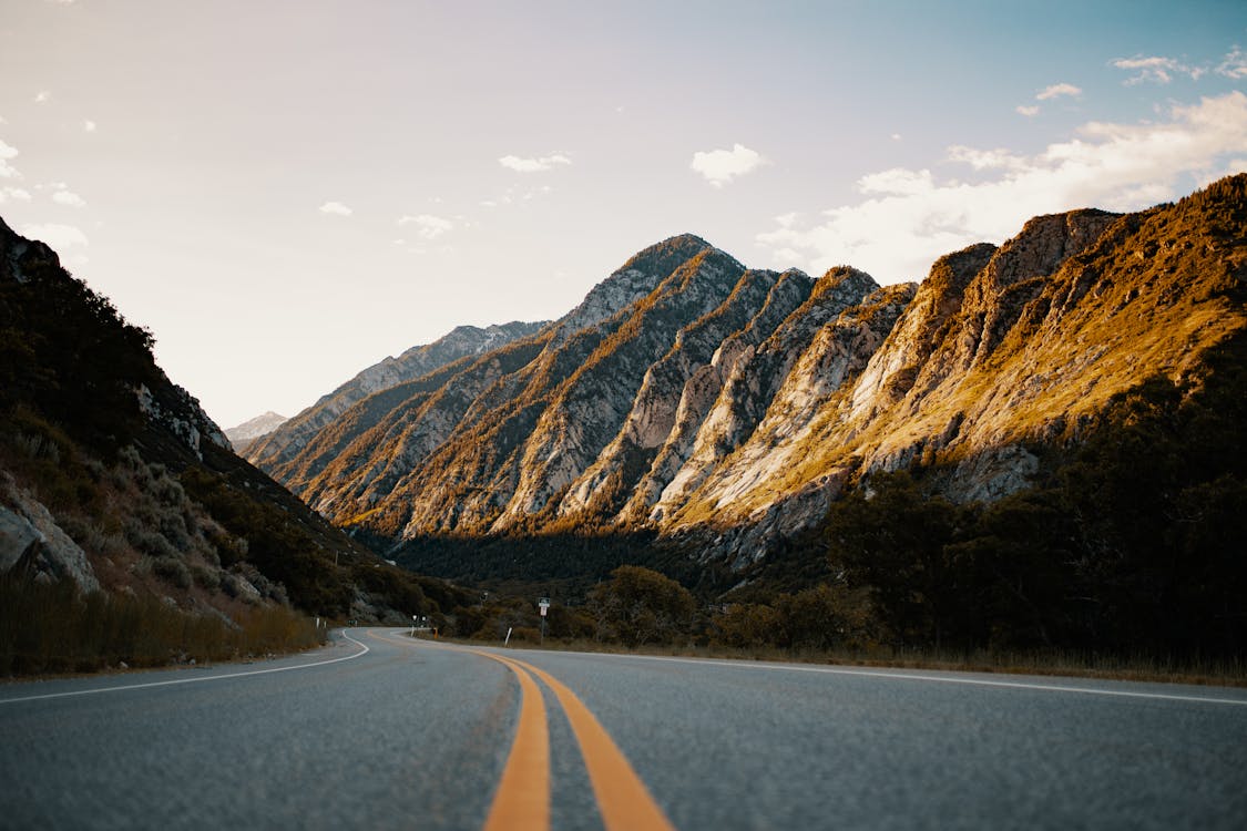 Landscape Photo of a Winding Road and a Mountain