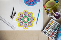 Mandala drawing on a workspace — photo by Ravi Kant on Pexels