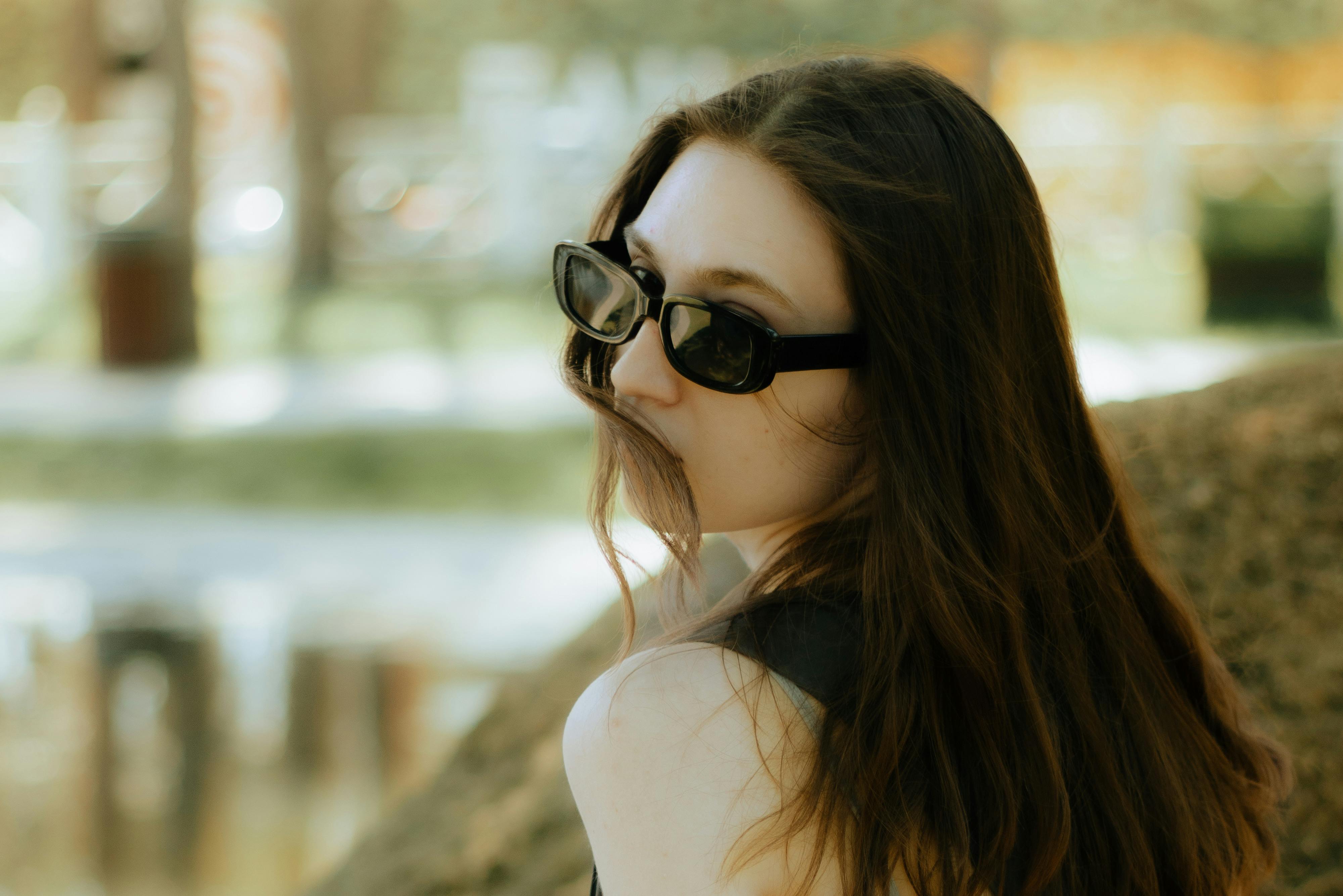 Brunette Woman with Sunglasses Free Stock Photo