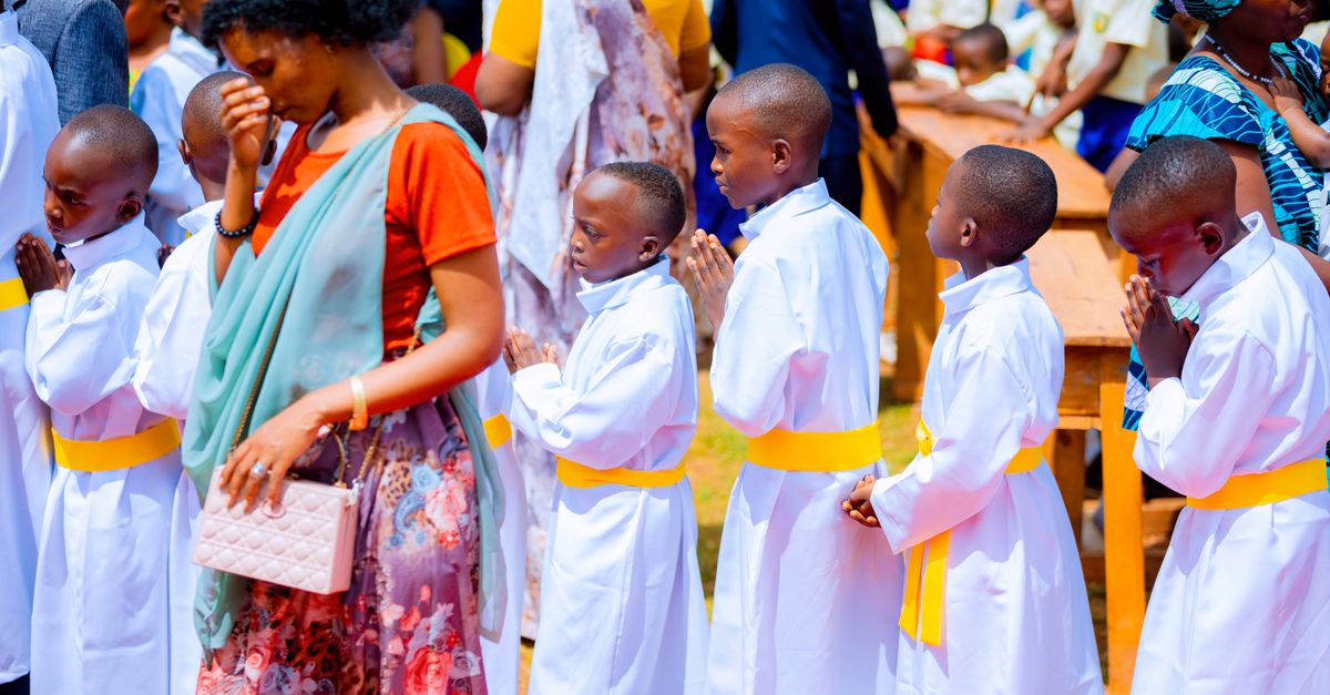 People chatting and laughing after a Sunday service at Christ Embassy Ho