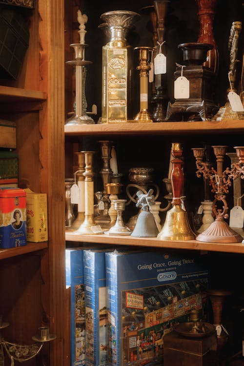 A bookcase filled with books and other items