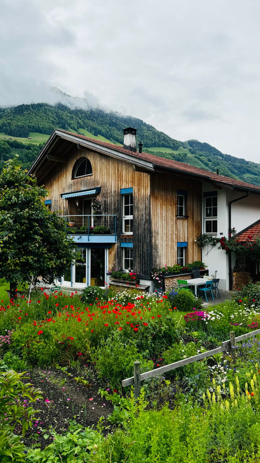 View of a House with a Garden in a Mountain Village · Free Stock Photo