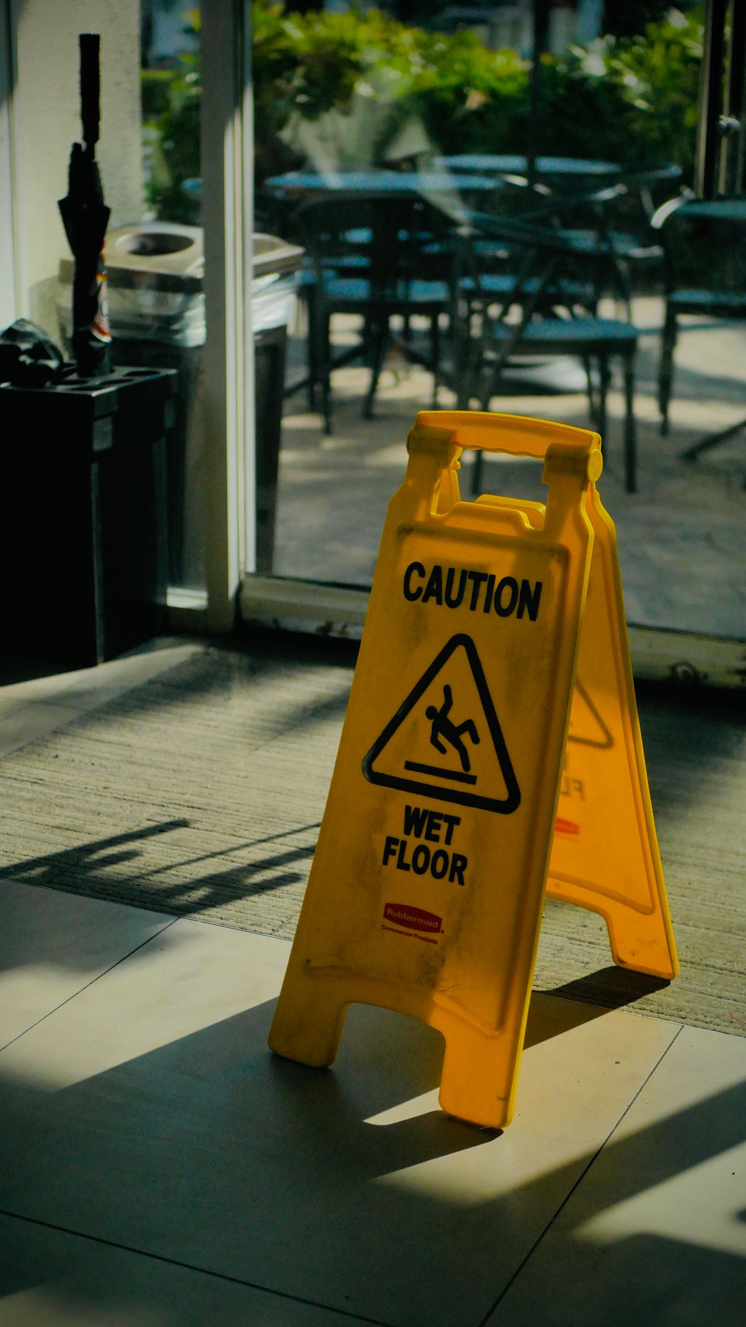 Wet floor warning sign inside a building