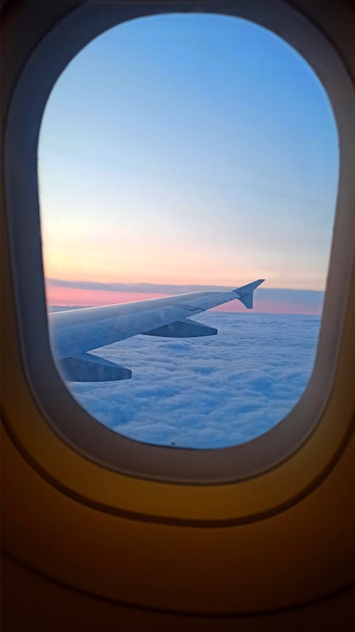 Δωρεάν στοκ φωτογραφιών με αεροπλάνο, δύση του ηλίου, θάλασσα σύννεφου