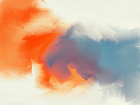 Vibrant abstract art piece blending orange and blue colors in a dynamic swirl.