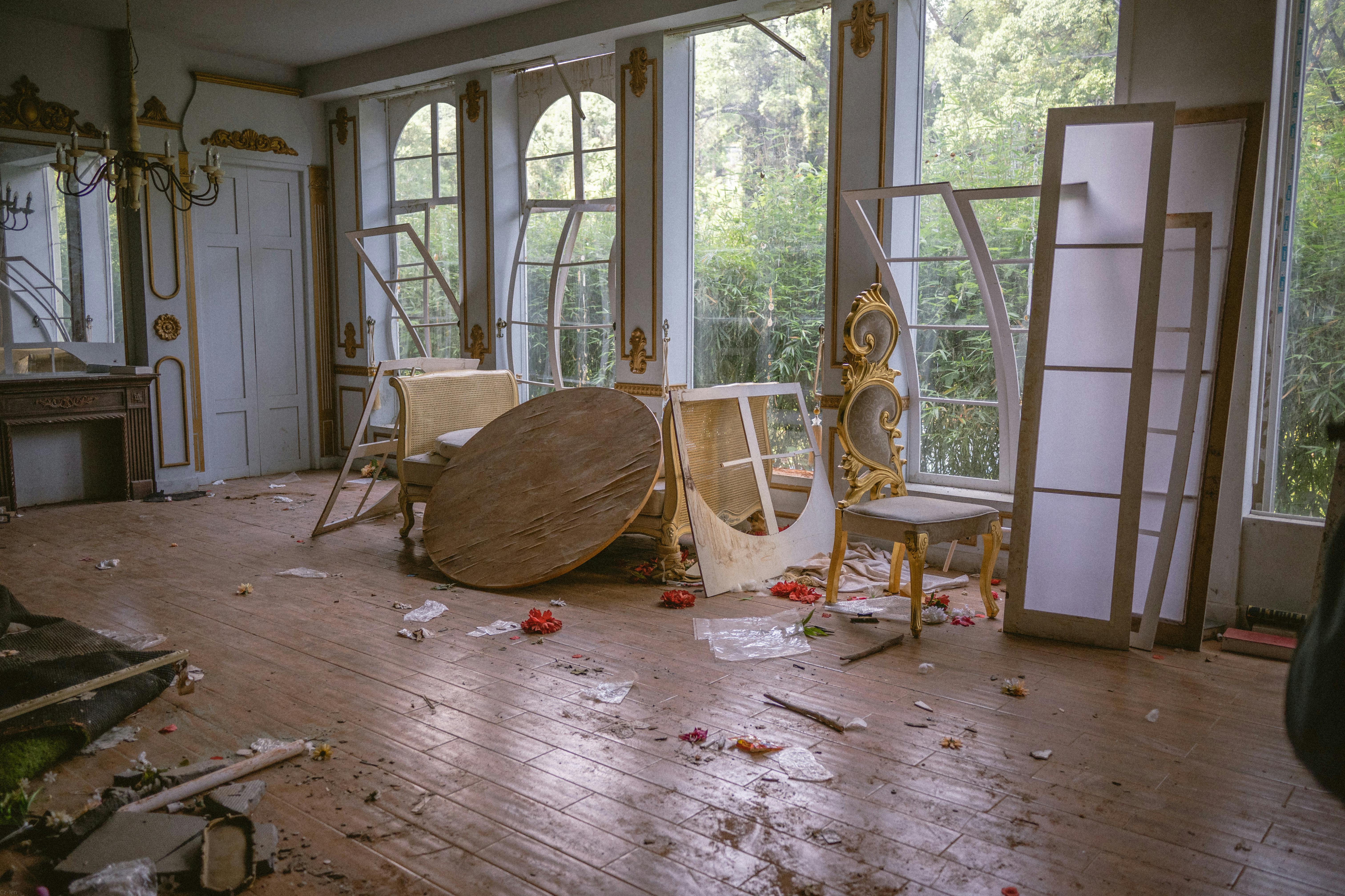 Explore the atmospheric decay of an elegant abandoned ballroom with vintage decor.