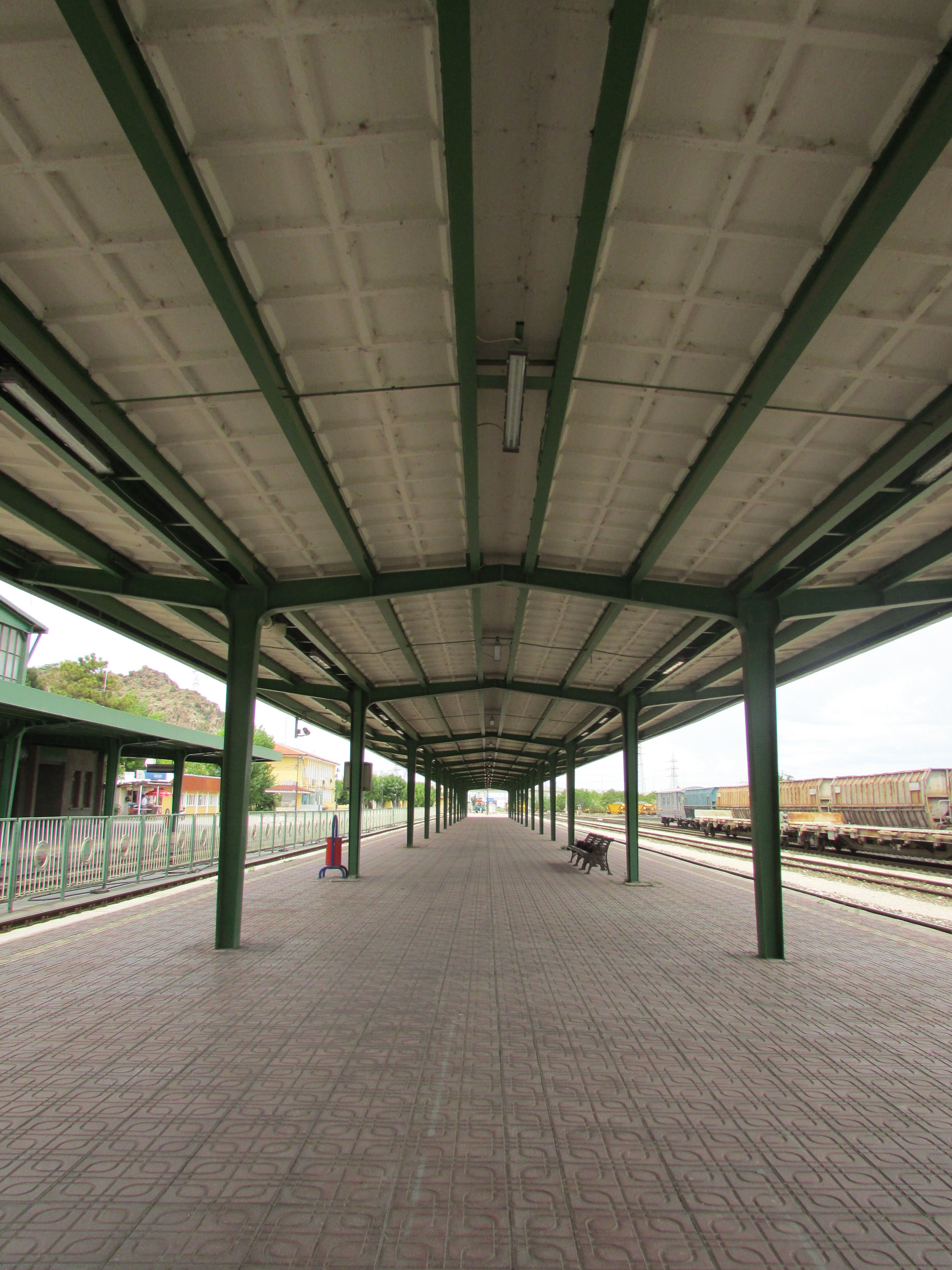 Symmetrical View of an Empty Train Station Platform · Free Stock Photo