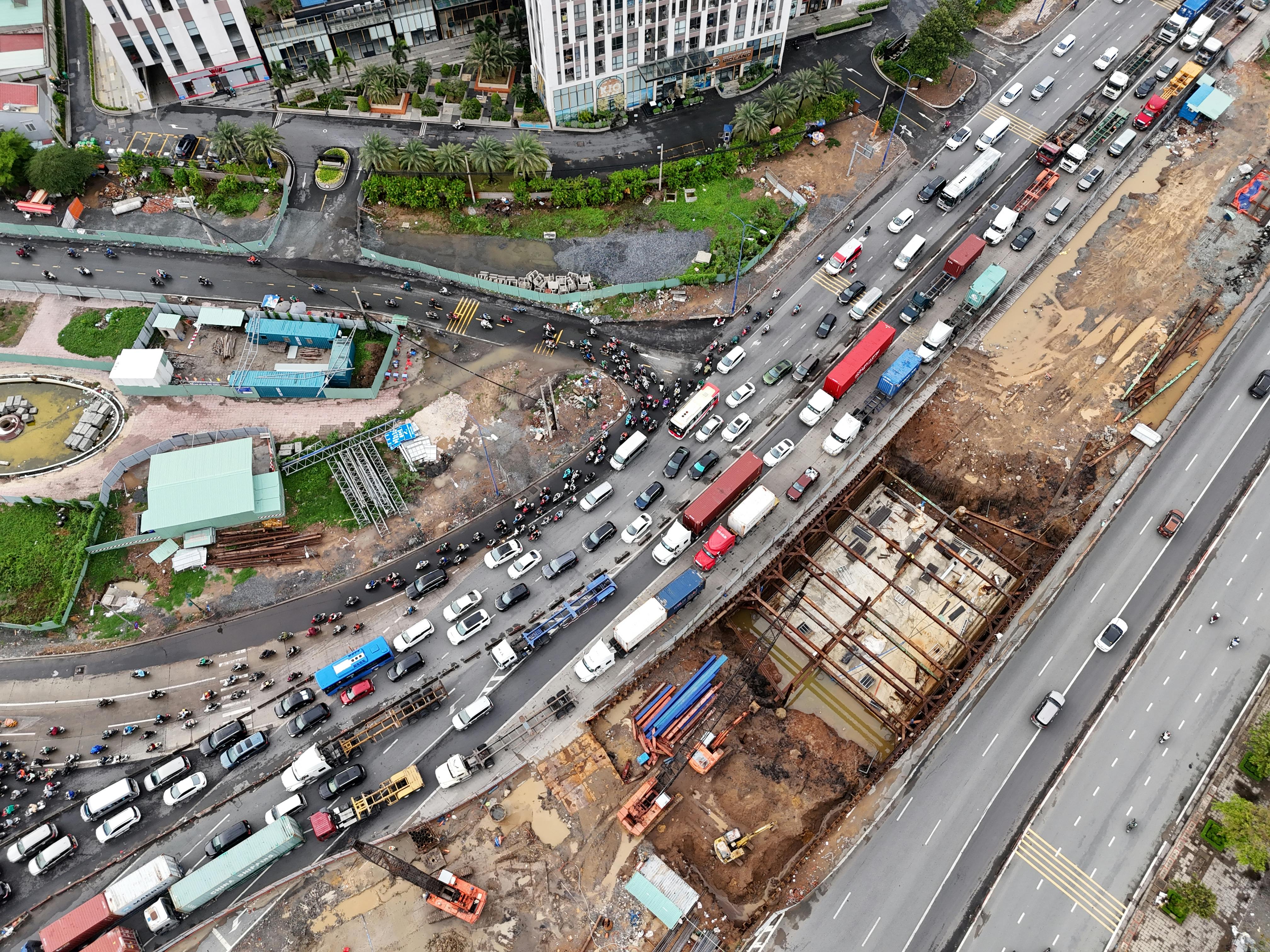 an aerial view of a busy highway with cars and trucks