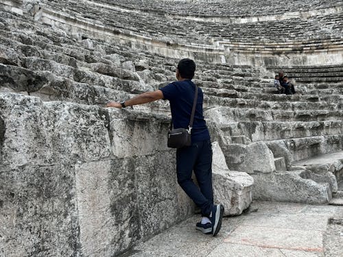 Man at a Roman theatre 