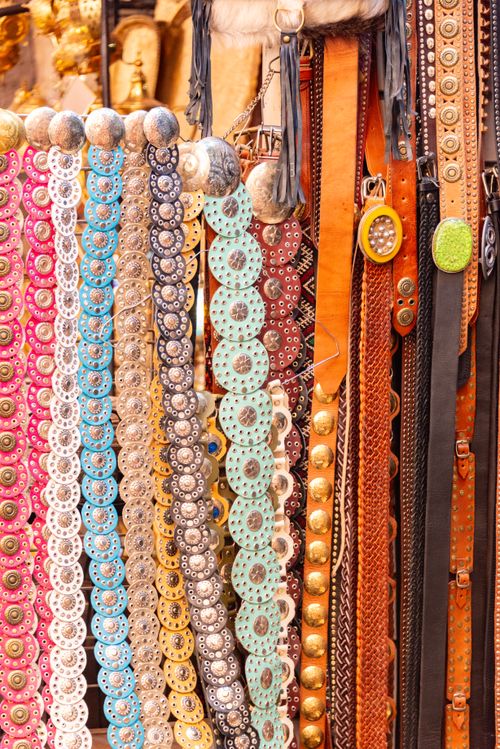Free Vibrant handmade belts on display, showcasing intricate designs and craftsmanship. Stock Photo