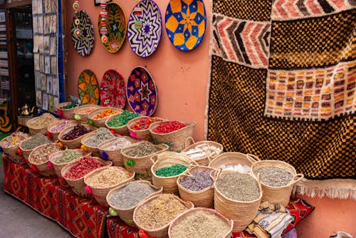 A display of colorful bowls and baskets on a table