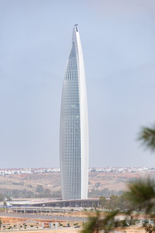 A tall building with a large white tower