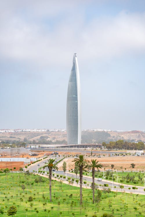 A large building with a tall tower in the background