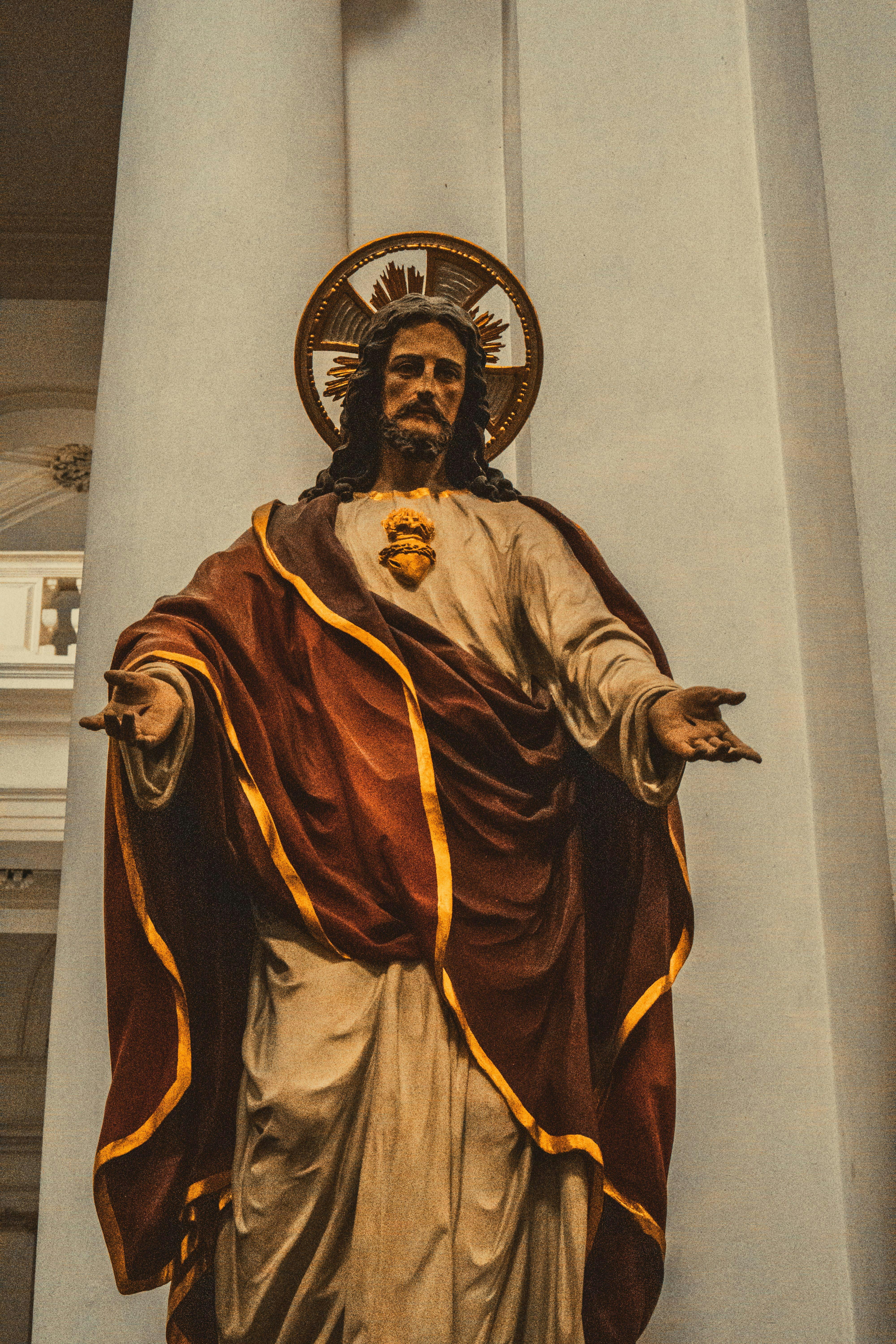 a statue of jesus in a church