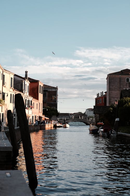 A canal in venice with buildings on either side