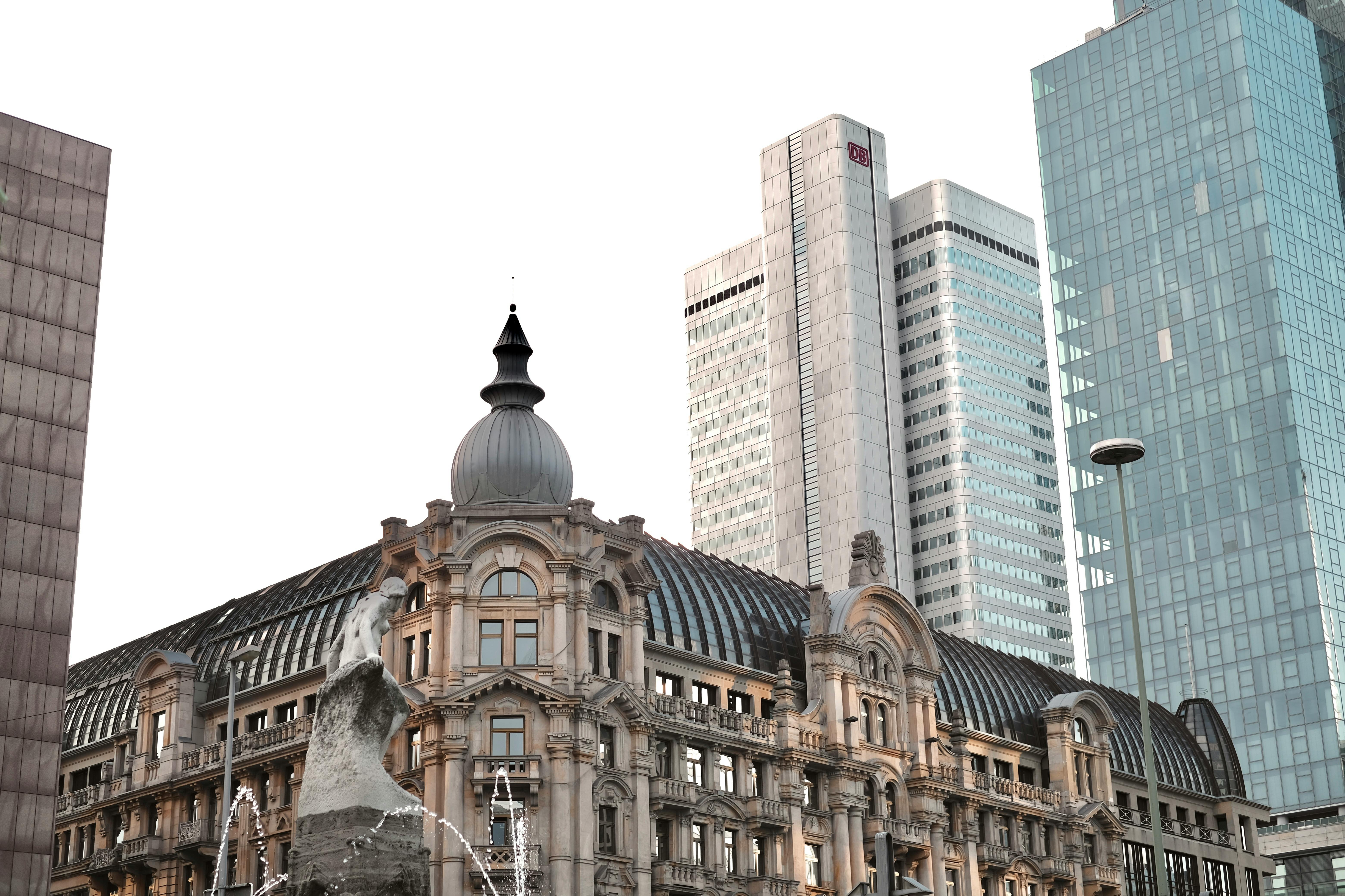 A blend of historic and modern buildings in Frankfurt's skyline, showcasing architectural diversity.