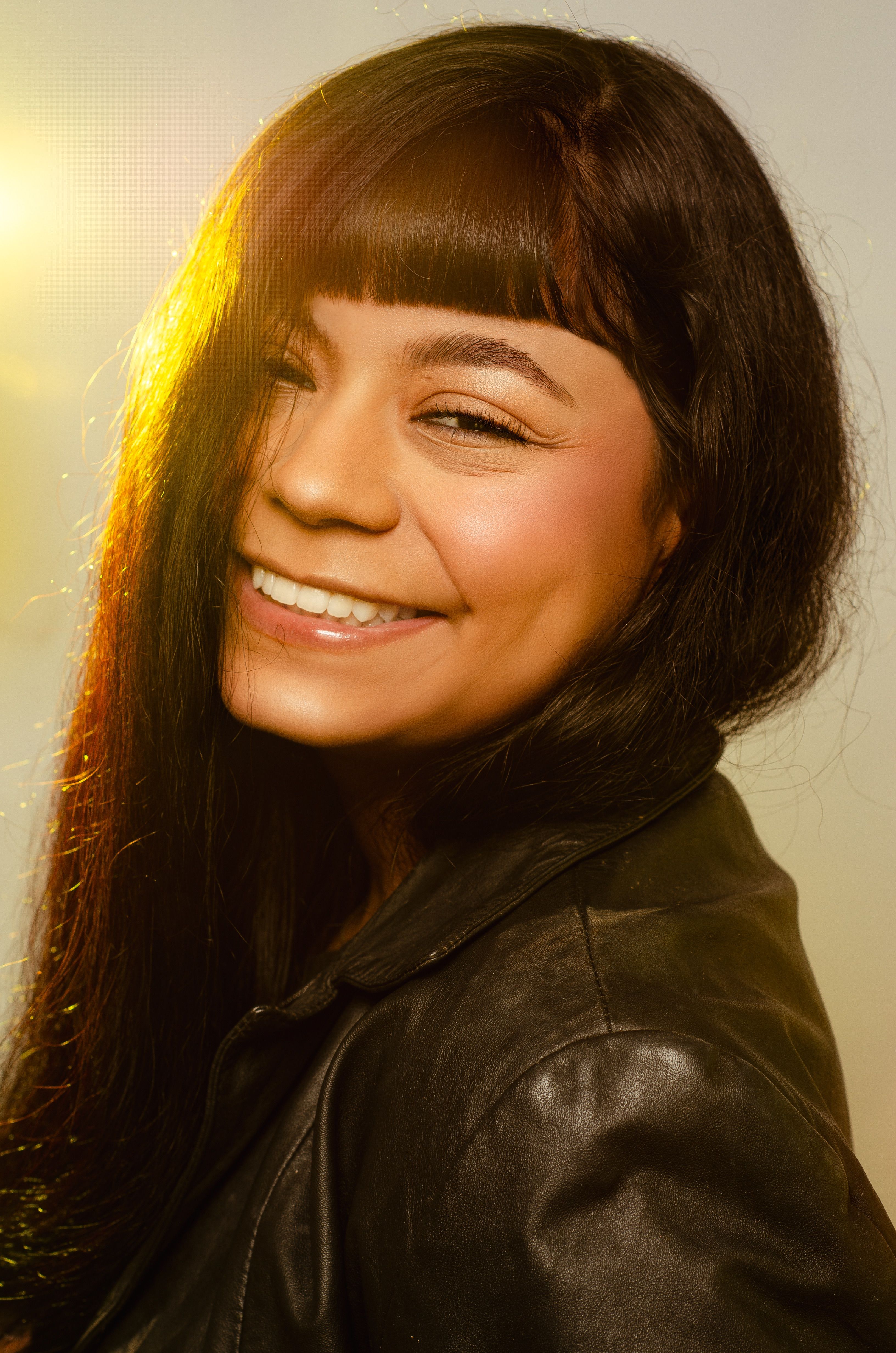 Portrait of a Young Woman in a Leather Jacket · Free Stock Photo