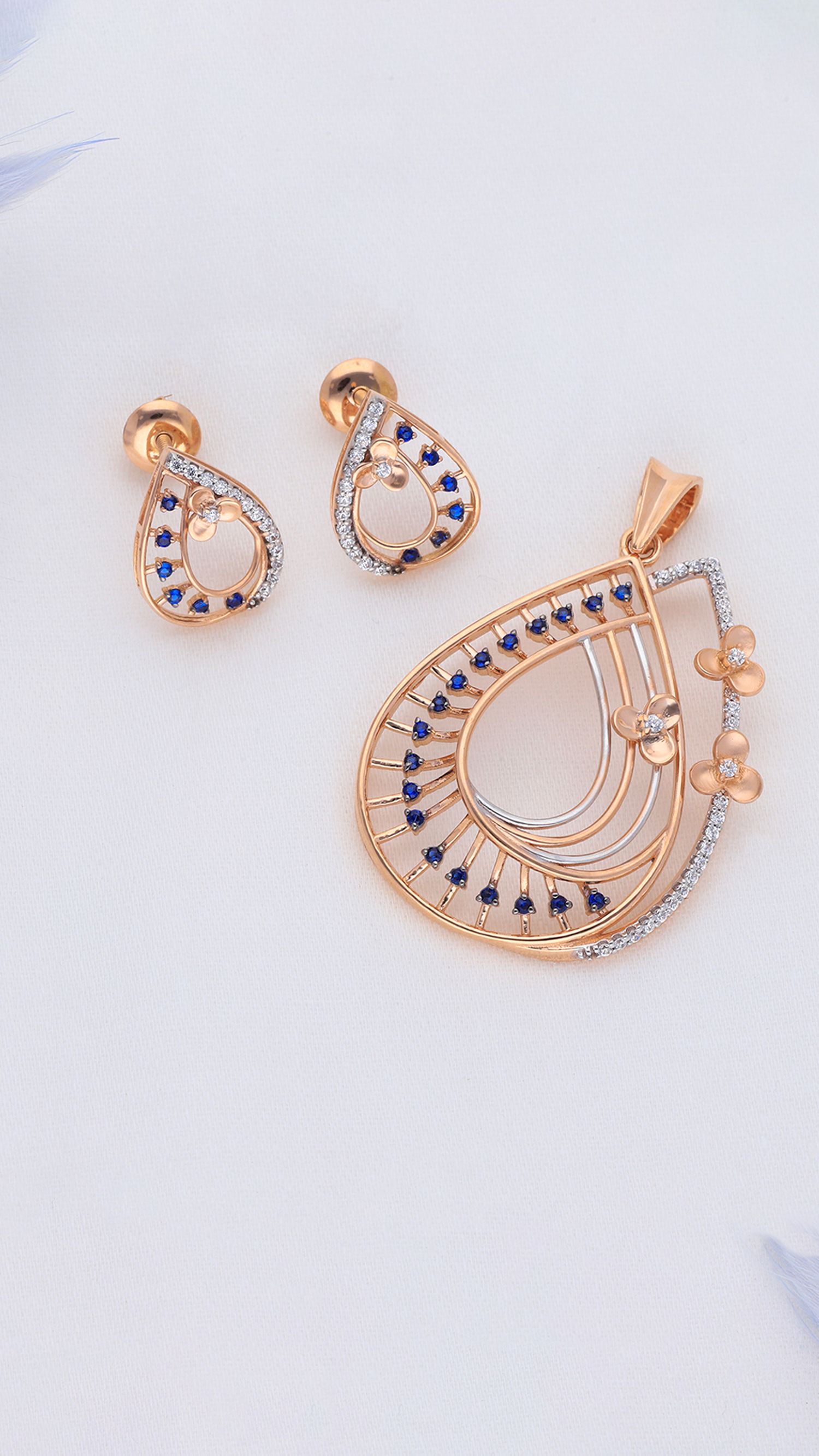 Gold jewellery set with blue stones
