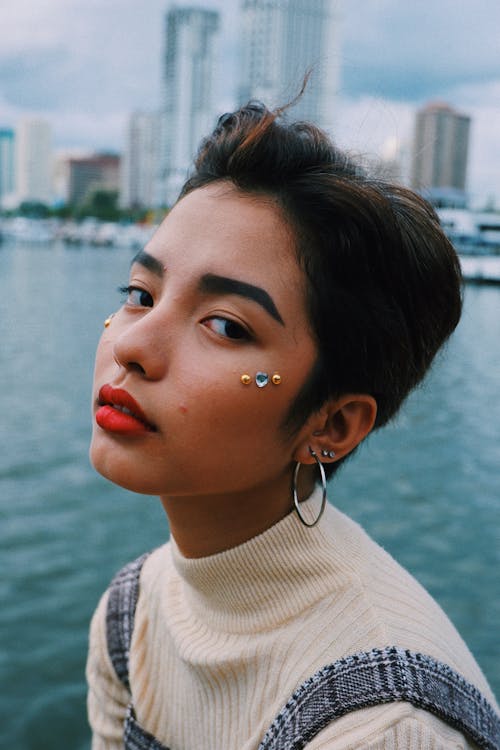 Woman With Short Hair With Stickers on Her Face