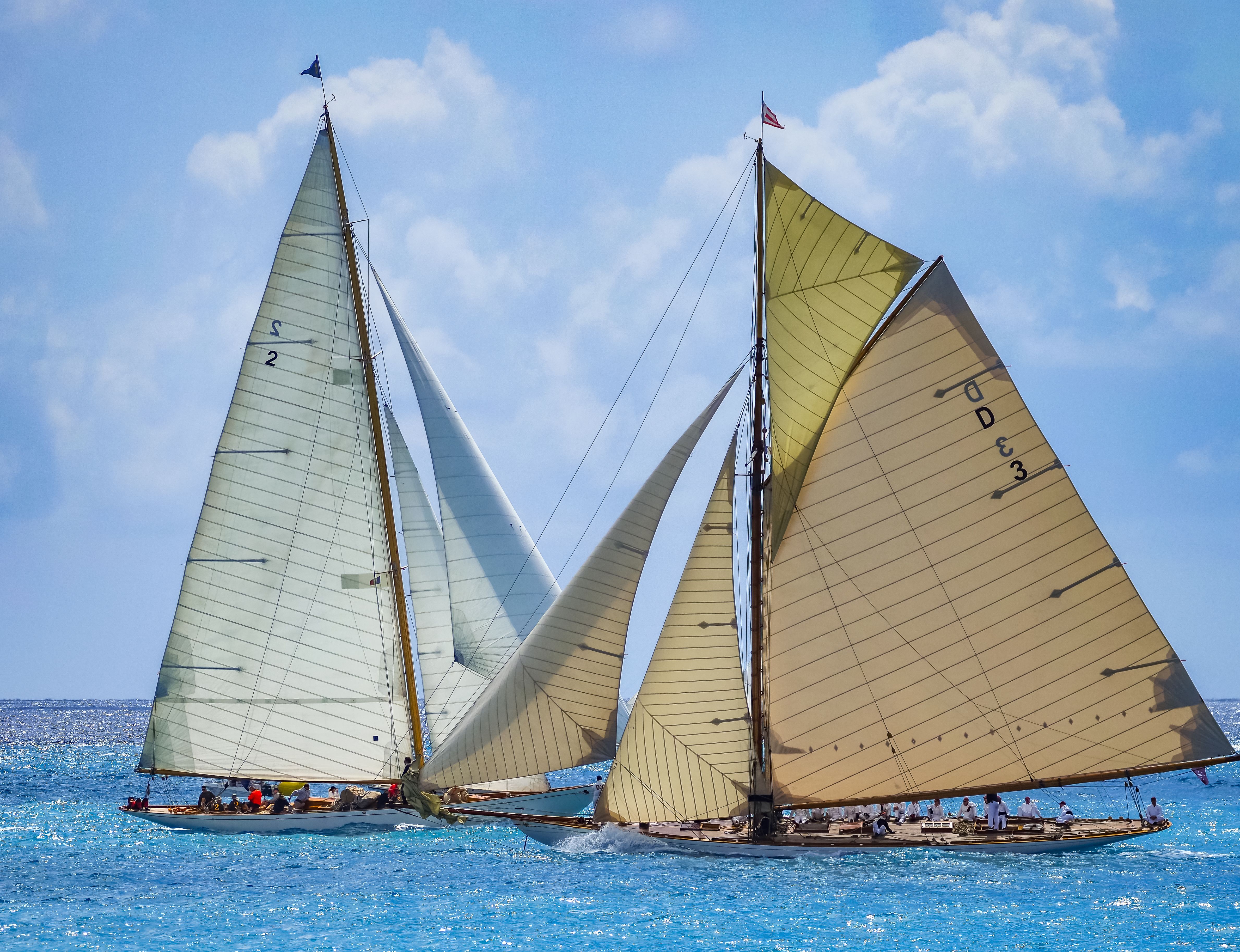 Best Waikiki Private Day Tour and Sunset Sail for Couples Review: The Ultimate Romantic Oahu Experience Review 2026 - Classic racing yachts compete under cloudy skies in Antibes, France, showcasing sailing elegance.