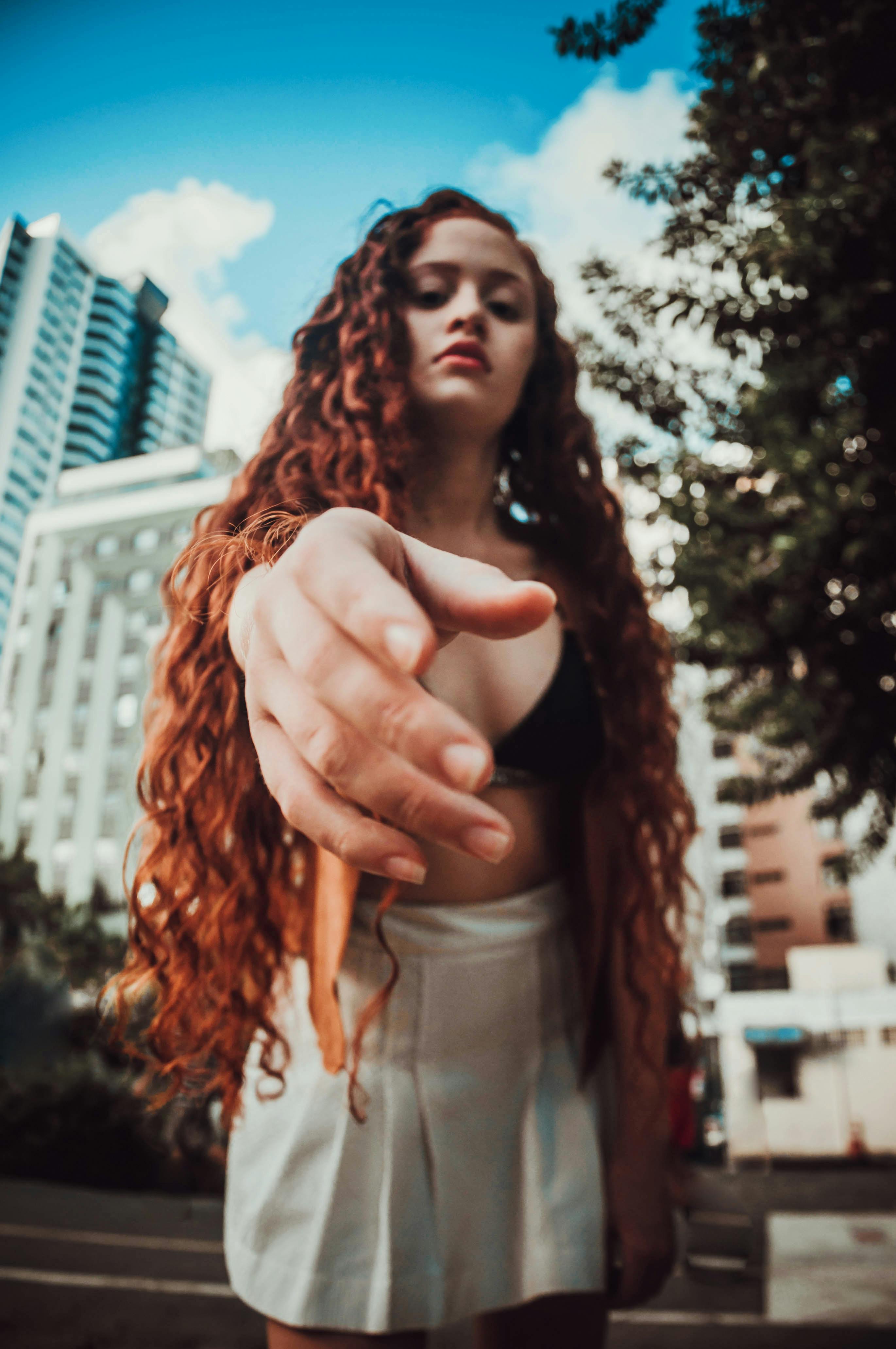 Selective focus of woman posing with building background photo – Free Tumblr  girl Image on Unsplash