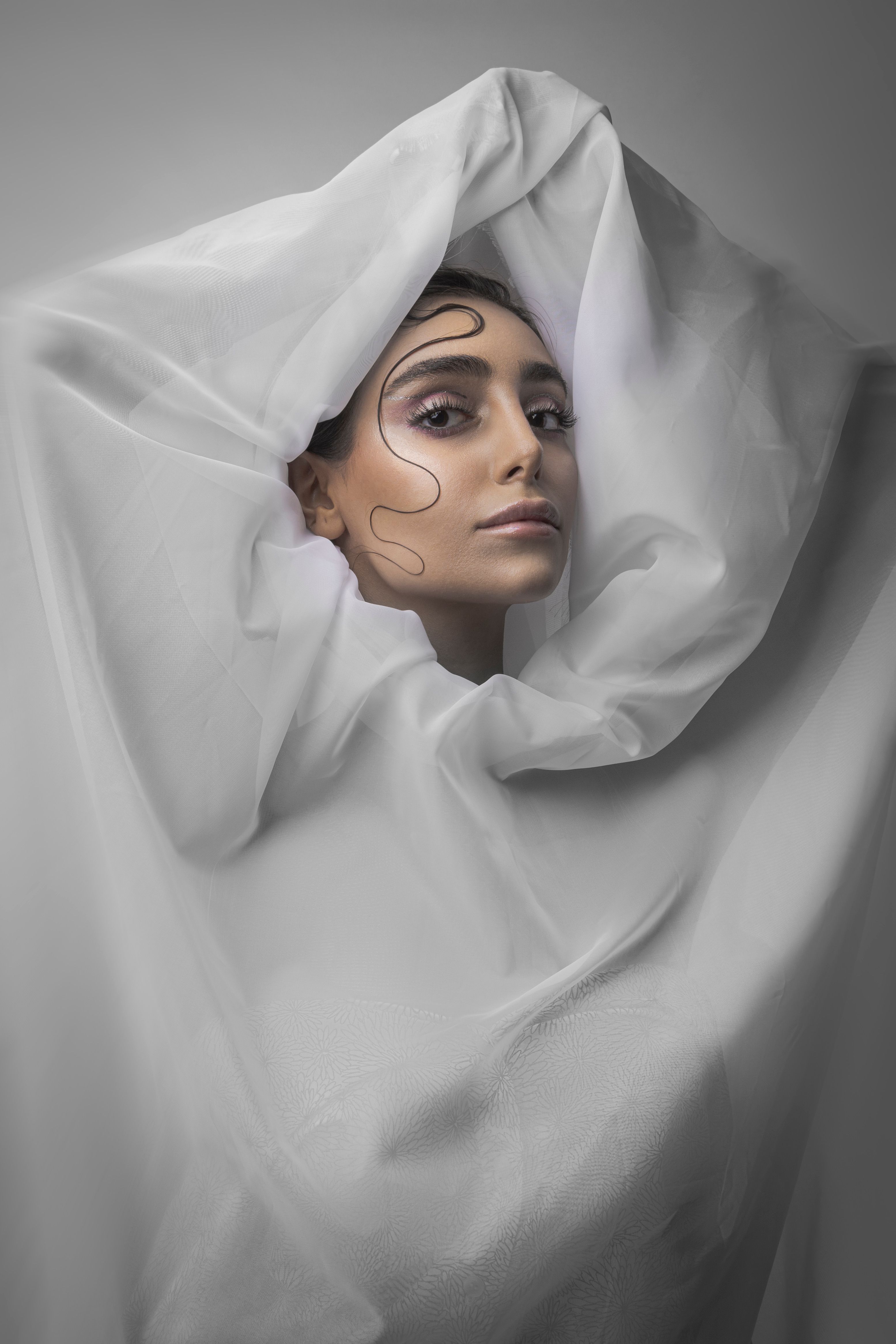 A woman with a veil on her face · Free Stock Photo