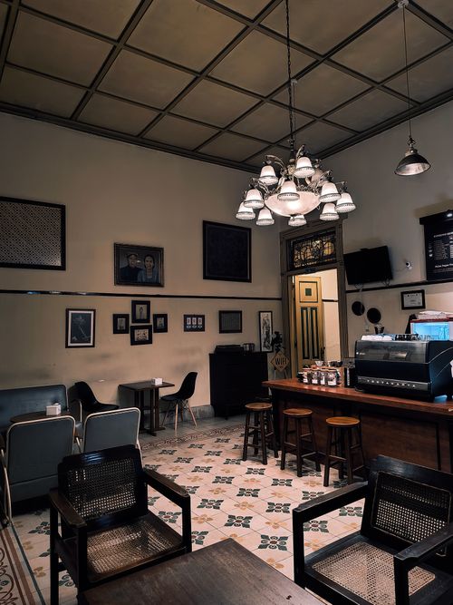 Free Charming vintage-style cafe interior in Jogja, Indonesia, with classic decor and cozy seating. Stock Photo