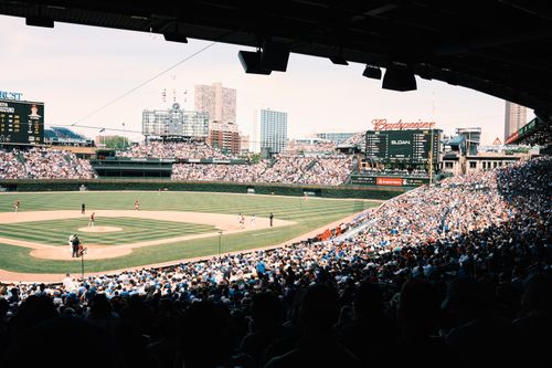 Free A lively baseball game at Wrigley Field with a packed crowd in Chicago, Illinois. Stock Photo