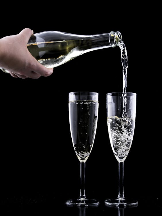 Close-up of Beer Glass Against Black Background