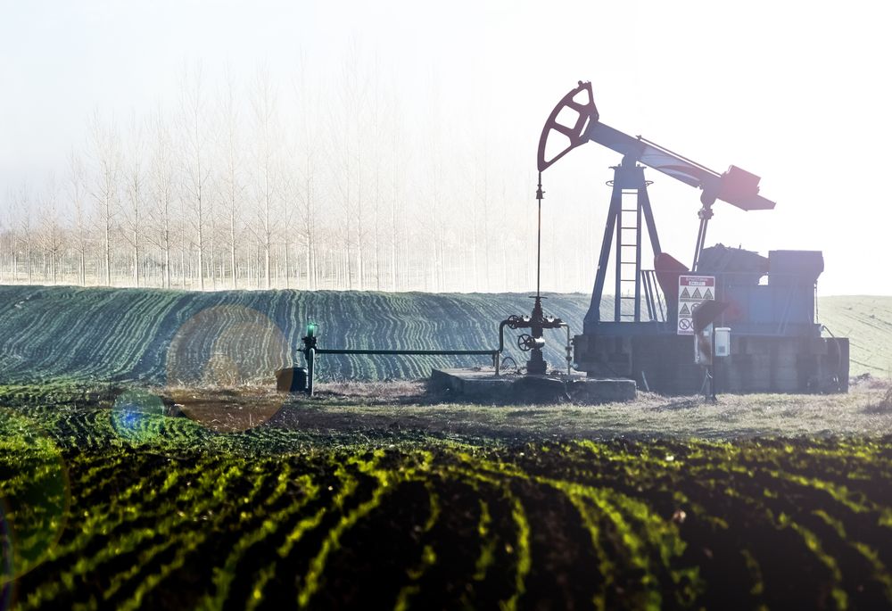 Pumpjack operating in a rural field