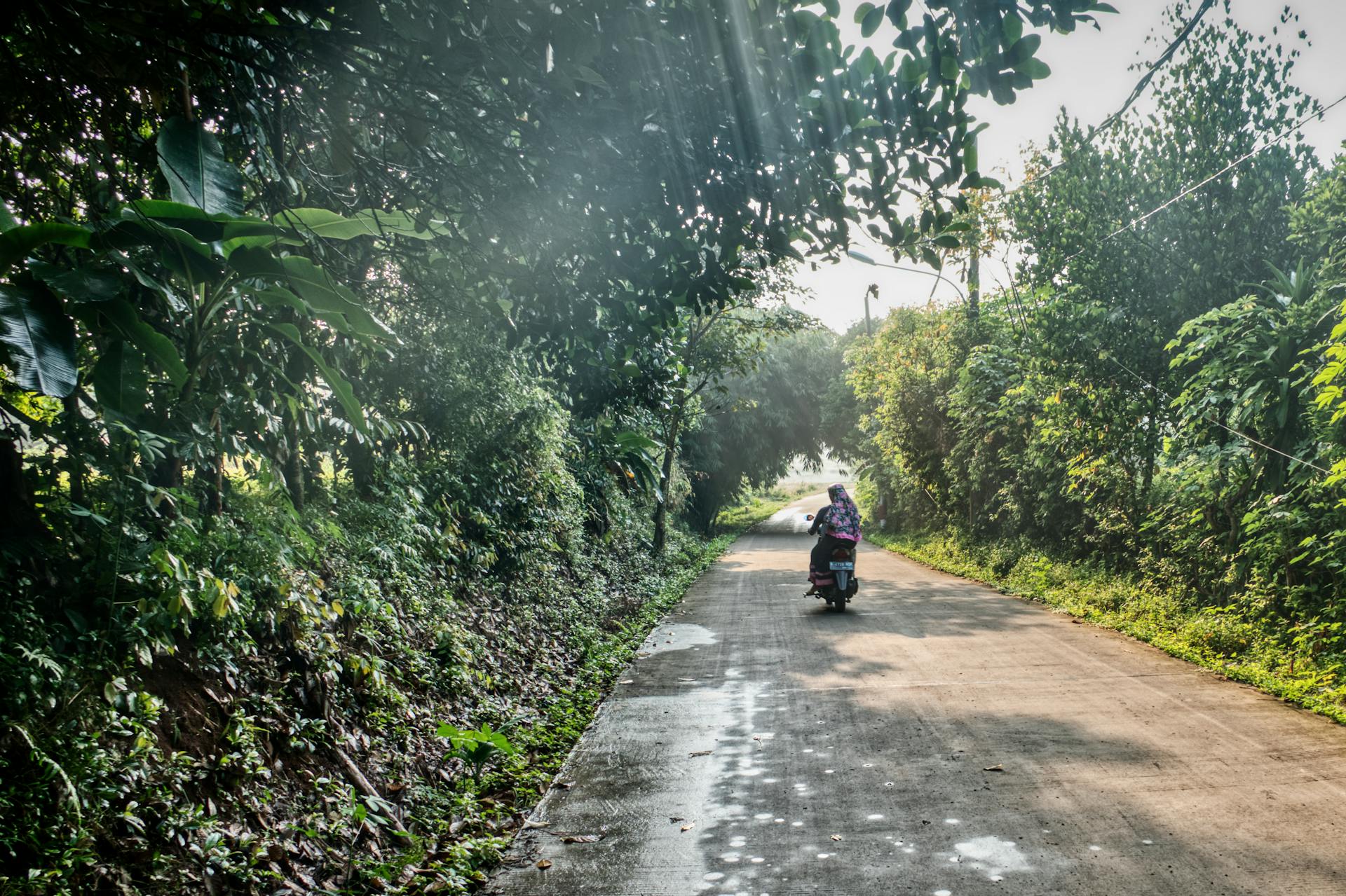 Photo of People Riding Motorcycle