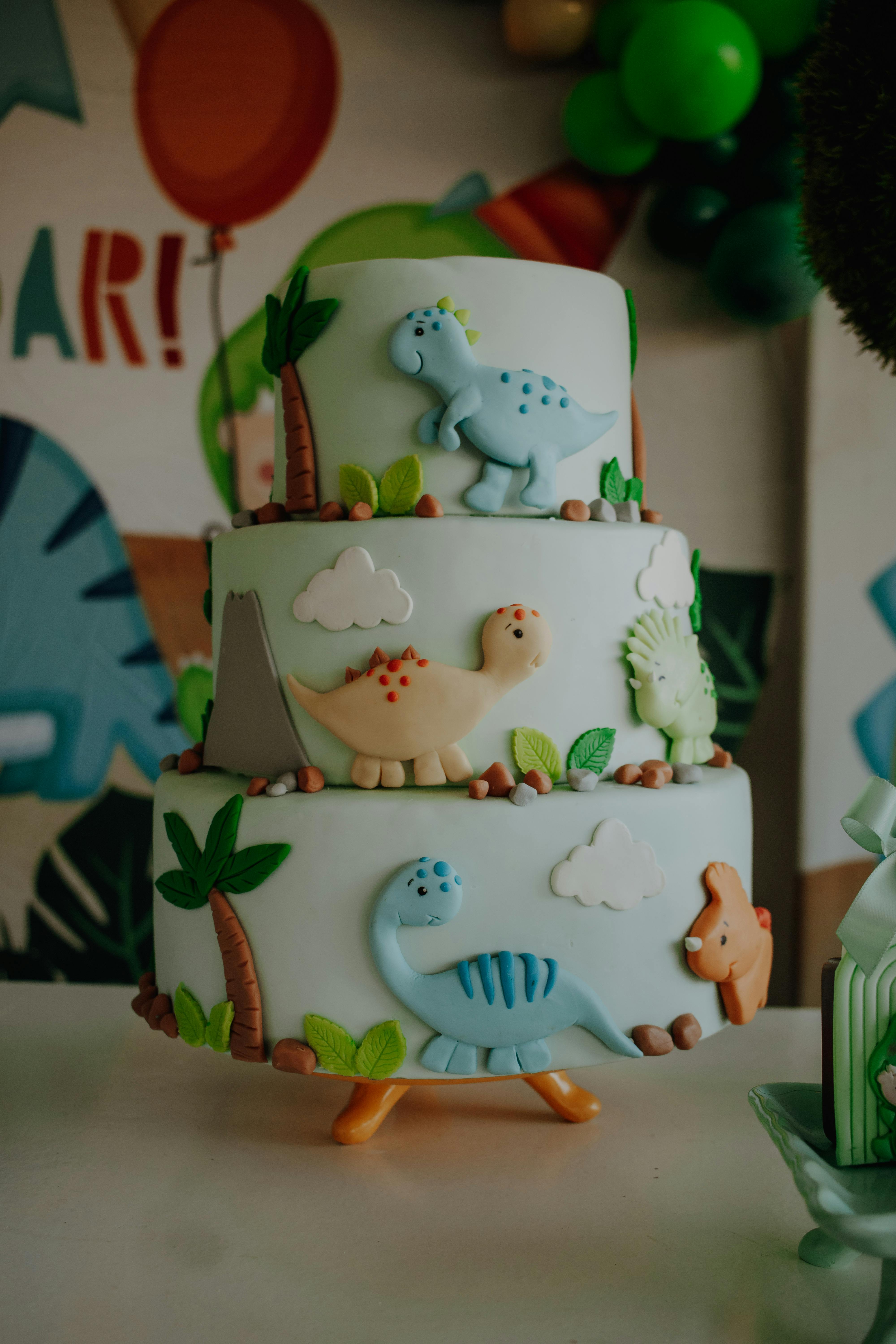 Gratis stockfoto met cake topper, creatieve cake, dinosaur model Stockfoto