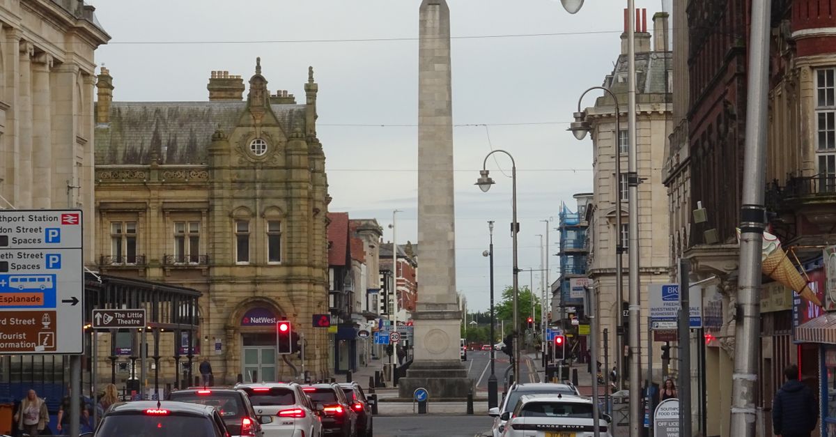 Street view of Southport War Memorial in Southport, England, showcasing urban architecture.