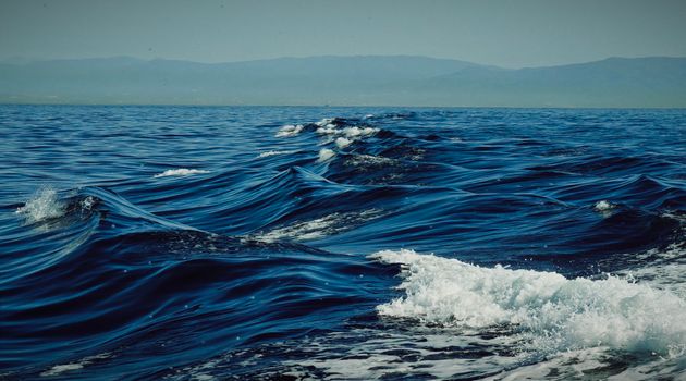 Tranquil scene of ocean waves and a distant horizon. Perfect for relaxation themes.