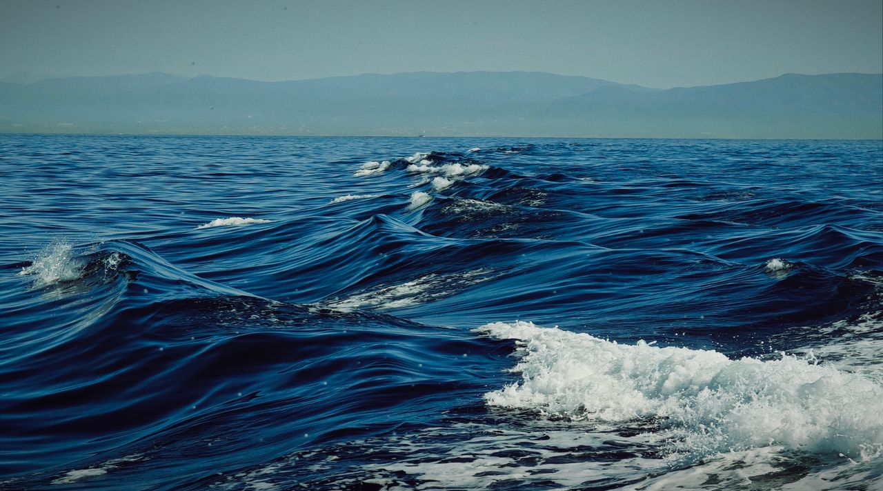 tranquil scene of ocean waves and a distant horizon perfect for relaxa
