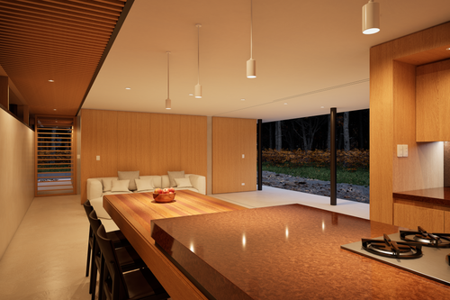 Free A stylish open-plan kitchen and living room with wooden accents and outdoor view. Stock Photo