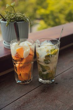 Tropical fruit cocktails with mango and avocado in Ho Chi Minh City, Vietnam, perfect for a summer refreshment.