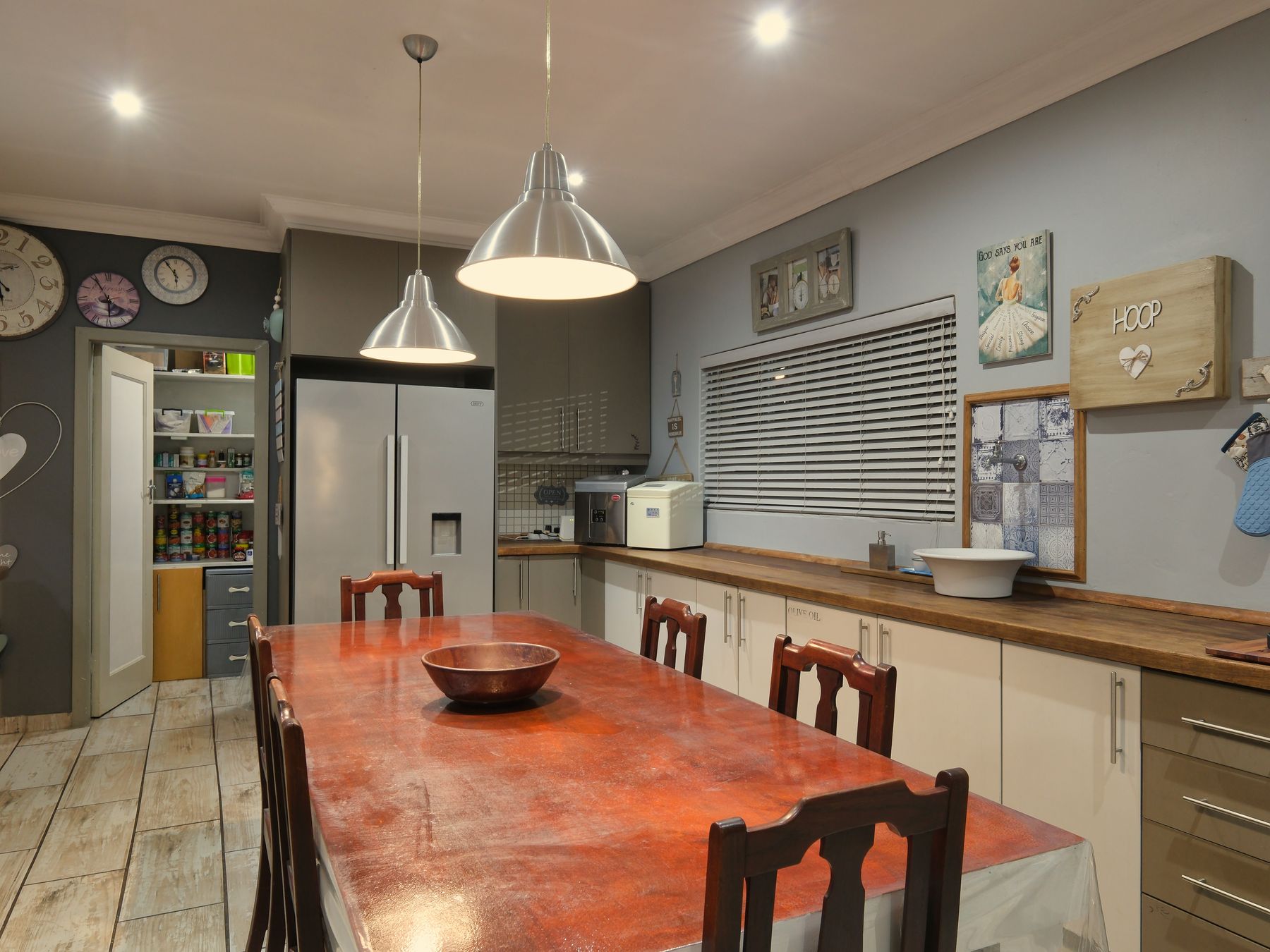 Kitchen Spraying in Brentford — careful masking before painting begins