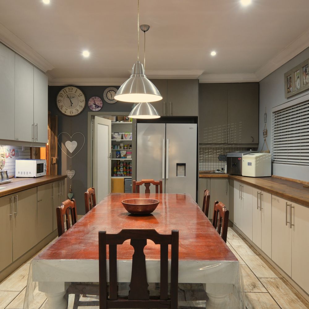Kitchen Spraying in West Hackney — surfaces prepped and cut in by hand