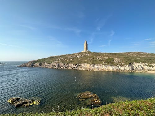 Torre de Hercules lighthouse on a hill overlooking the ocean, A Coruña, Galicia, Spain, May 2023
