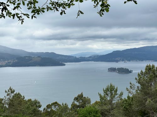 Ría de Vigo estuary with San Simón island amidst the mountains near Redondela, Galicia, Spain, April 2023