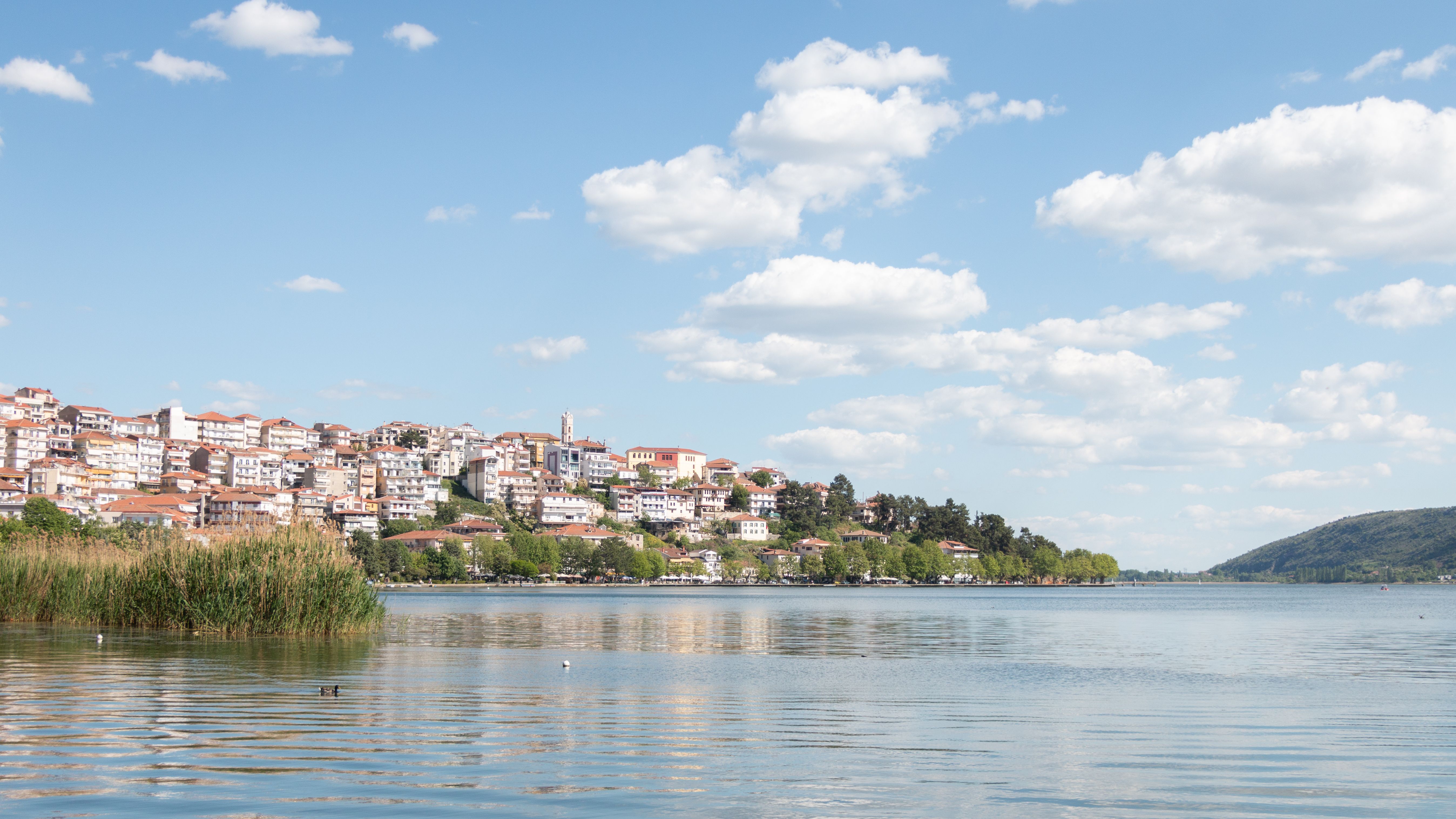 Lake Orestiada in Kastoria with Byzantine churches and mansions along the shore