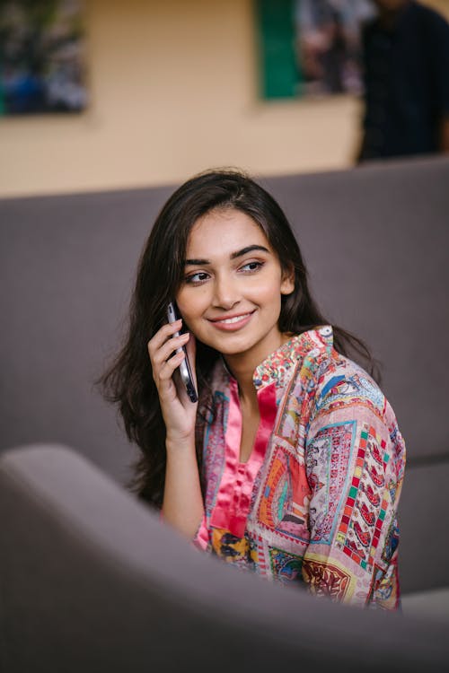 Free Photo of Smiling Woman Talking on Phone Stock Photo