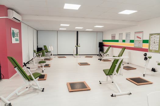 Bright and spacious gym interior featuring modern green exercise machines in Yalova.