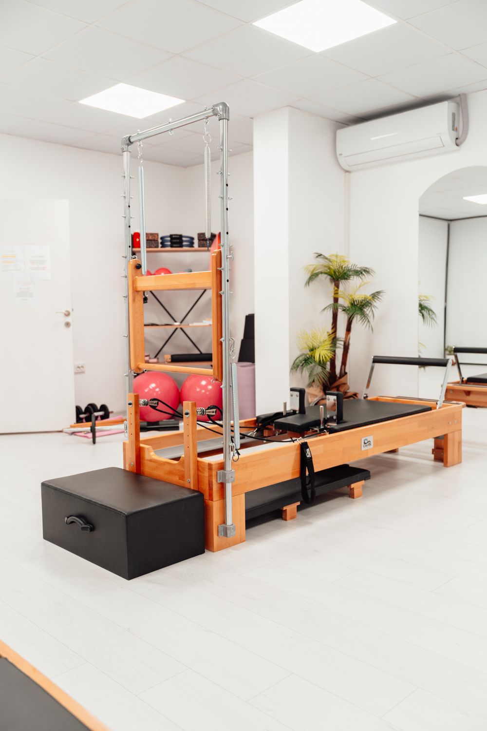 Pilates studio with wooden reformers