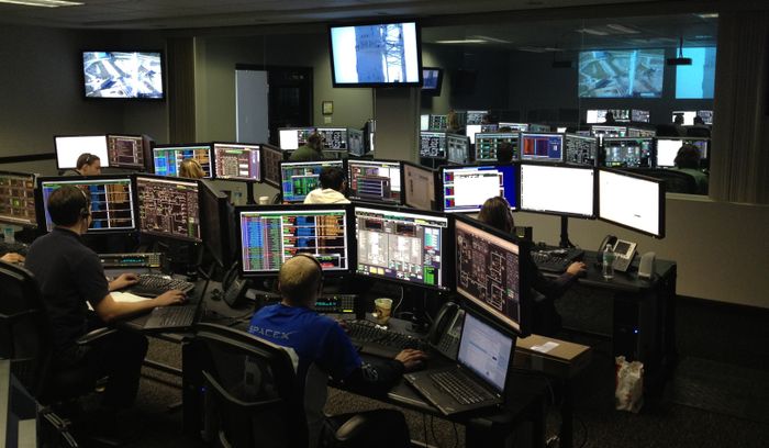 Support engineers working at night to keep operations running around the clock
