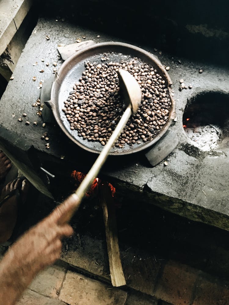 Person Holding Ladle