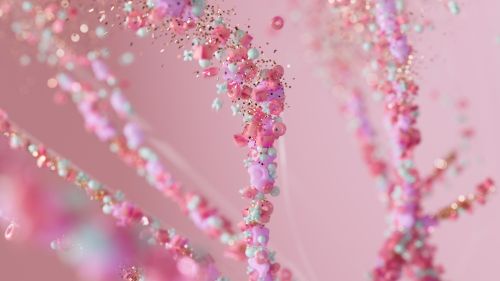 Free Close-up of pink and gold sparkling beads on a pastel pink background, creating a dreamy and abstract visual. Stock Photo