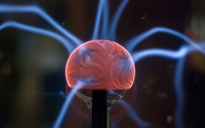 A close-up of glowing blue-purple plasma.